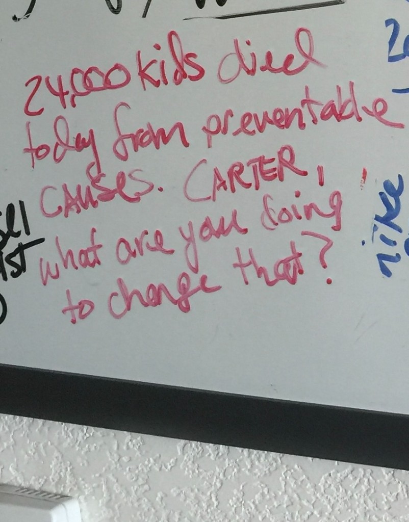 Carter's whiteboard: 24,000 kids died today from preventable causes. Carter, what are you doing to change that?